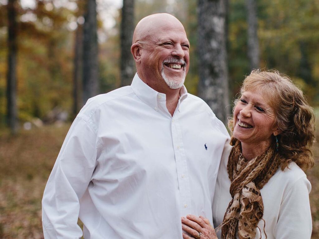 Patient smiling after dental implant procedure