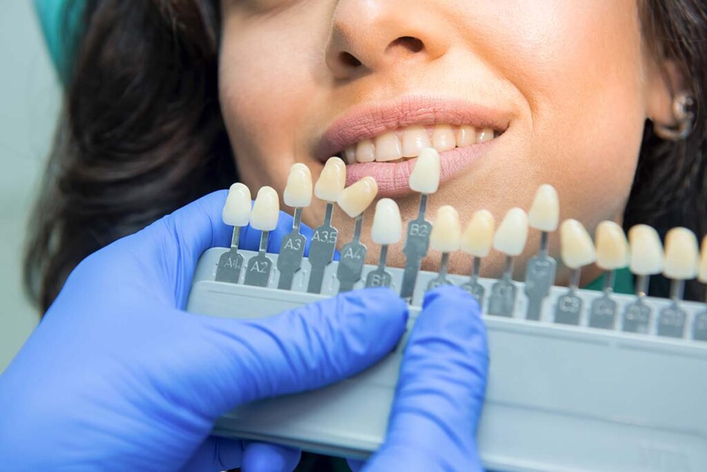 Woman undergoing teeth whitening treatment at GT Dental Studio